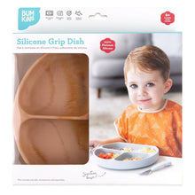 Load image into Gallery viewer, Bumkins Silicone Grip Dish: Wood Grain in a white packaging box with a photo of a child and a clear window partially displaying the dish.
