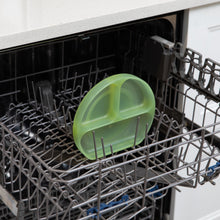 Load image into Gallery viewer, Bumkins Silicone Grip Dish: Green Jelly sits in the top rack of an open dishwasher.