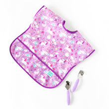 Load image into Gallery viewer, Bumkins Spoon + Fork: Lavender lays next to a purple unicorn-patterned bib on a white background.