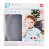 Bumkins Silicone Grip Plate: Gray in a white packaging box with a photo of a child and a clear window partially displaying the dish.