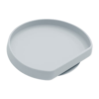 Bumkins Silicone Grip Plate: Gray is a round snack plate with a raised edge and open section, made from food-safe silicone.