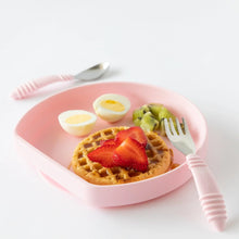 Load image into Gallery viewer, Bumkins Silicone Grip Plate: Pink holds waffles, strawberries, eggs, and kiwi beside pink utensils on a white background.