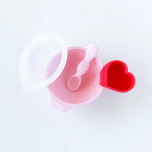 Load image into Gallery viewer, A red Bumkins Silicone Little Dipper 3-Pack: Tutti-Frutti attached to a pink bowl with a matching spoon and clear lid on a white background.