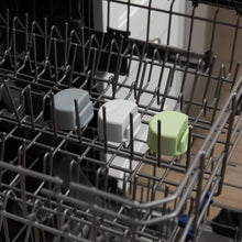 Load image into Gallery viewer, Bumkins Silicone Little Dipper Round 3-Pack: Taffy sits in the top rack of an open dishwasher.