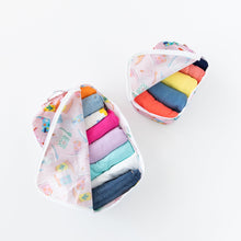 Load image into Gallery viewer, Bumkins Packing Cube 2 Pack: Boots shown open with colorful clothes inside, crafted from waterproof fabric, set against a white background.