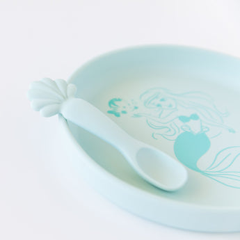 Close-up of Bumkins Silicone Plate + Spoon Set: Disney Princess Ariel on a white background.