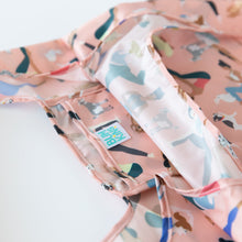 Load image into Gallery viewer, Close-up of Bumkins Packable Tote Bag: Yoga Pals on a white background, with focus on the interior pocket.