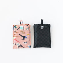 Load image into Gallery viewer, Two folded tote bags, including a Bumkins Packable Tote Bag: Rich Black, lay on a white background.