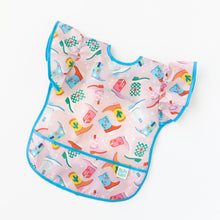 Load image into Gallery viewer, Bumkins Ruffle Apron Bib: Boots lays flat on a white background.