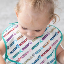 Load image into Gallery viewer, A child wearing a white Bumkins SuperBib® 3 Pack: Mickey & Friends MVP cartoon names like Mickey, Minnie, Pluto & Goofy.