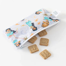 Load image into Gallery viewer, Cookies spill from a purple Bumkins Reusable Snack Bag, 3-Pack: Princess Magic, Ariel, and Jasmine on a white background.