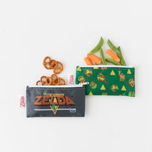 Load image into Gallery viewer, Pretzels and veggies spill from Bumkins Reusable Snack Bag, 3-Pack: The Legend of Zelda™ on a white background.