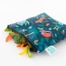 Load image into Gallery viewer, Fresh veggies spill from an open Bumkins Reusable Snack Bag, Large 2-Pack: Jungle & Animal Prints on a white background.