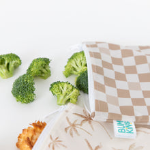 Load image into Gallery viewer, Bumkins Reusable Snack Bag, Large 2 Pack: Palm Check, with waterproof fabric, displayed with broccoli florets on a white background.