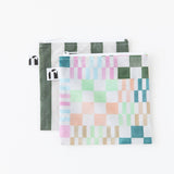 Roamio by Bumkins Reusable Snack Bag, Large 2 Pack: Motley Club lays overlapped on a white background.