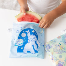 Load image into Gallery viewer, A child puts a watermelon slice into a Bumkins Reusable Snack Bag, Large 2 Pack: Stitch Star-ring Up Trouble on a white table.