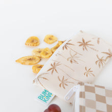 Load image into Gallery viewer, Banana chips spill from a Bumkins Reusable Snack Bag, Small 2 Pack: Palm Check on a white background.