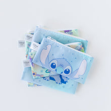 Load image into Gallery viewer, Bumkins Reusable Snack Bag, Small 2 Pack: Stitch Star-ring Up Trouble lays stacked on top of similar bags on a white background.