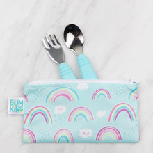 Load image into Gallery viewer, Bumkins Reusable Snack Bag, Small 2-Pack: Rainbows & Unicorns holds a blue fork and spoon on a marble background.
