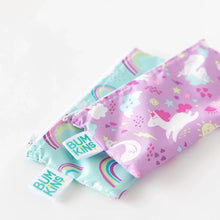 Load image into Gallery viewer, Bumkins Reusable Snack Bag, Small 2-Pack: Rainbows & Unicorns lays stacked on a white background.