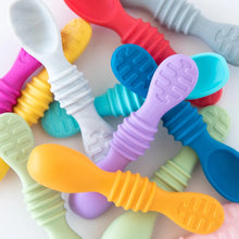 Load image into Gallery viewer, A pile of silicone spoons, including Bumkins Silicone Dipping Spoons 3 Pack: Gumdrop, on a white background.