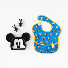 Load image into Gallery viewer, Bumkins Silicone Chewtensils®: Mickey Mouse rest near a Mickey Mouse-shaped plate and a blue Disney character bib on a white background.