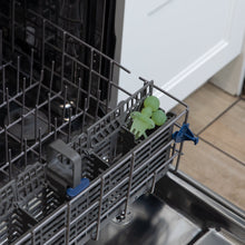 Load image into Gallery viewer, Bumkins Silicone Chewtensils®: Green Jelly sit in the utensil compartment of an open dishwasher.