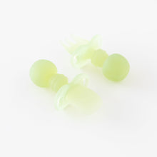Load image into Gallery viewer, Bumkins Silicone Chewtensils®: Green Jelly are displayed on a white background with one face-down, showcasing sensory bumps on the back.