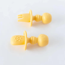Load image into Gallery viewer, Bumkins Silicone Chewtensils®: Pineapple lay face-down on a white background, showcasing sensory bumps on the back.