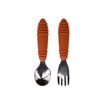 Load image into Gallery viewer, Bumkins Spoon + Fork: Clay includes two utensils with orange ribbed silicone handles and stainless steel heads.