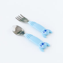 Load image into Gallery viewer, Bumkins Spoon + Fork: Stitch rests on a white background, with the Stitch-shaped handles facing the camera.