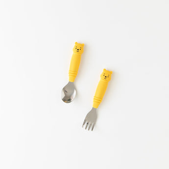 Bumkins Spoon + Fork: Winnie the Pooh rests on a white background.