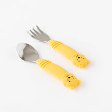 Load image into Gallery viewer, Bumkins Spoon + Fork: Winnie the Pooh lays angled on a white background, with focus on the bear-shaped handles.