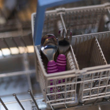 Load image into Gallery viewer, Bumkins Spoon + Fork: Purple sits in the utensil compartment of an open dishwasher.