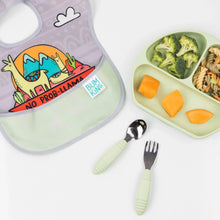 Load image into Gallery viewer, Bumkins Spoon + Fork: Sage sits near a llama bib and a green plate with pasta, broccoli, and melon cubes on a white background.