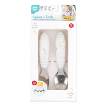 Load image into Gallery viewer, Bumkins Spoon + Fork: Vanilla Sprinkle is shown in a white packaging box with a clear front window displaying the set of utensils.