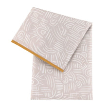 Load image into Gallery viewer, Bumkins Splat Mat: Wander is a beige, waterproof, machine washable mat with abstract white patterns and an orange trim.