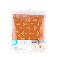 Load image into Gallery viewer, Bumkins Splat Mat: Grounded is shown folded in plastic packaging bag with a hanger and cardboard insert.