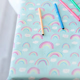 Close-up of colorful markers on a Bumkins Splat Mat: Rainbows.