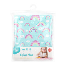 Load image into Gallery viewer, Bumkins Splat Mat: Rainbows is shown folded in a plastic packaging bag with a hanger and cardboard insert.