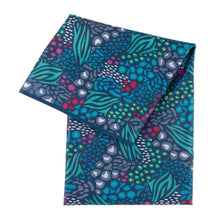Load image into Gallery viewer, Bumkins Splat Mat: Animal Prints—abstract animal print pattern in blue, green, red, and white on dark waterproof fabric.