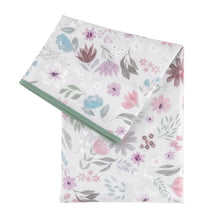 Load image into Gallery viewer, Bumkins Splat Mat: Floral features a pastel floral print on waterproof fabric with a green trim.