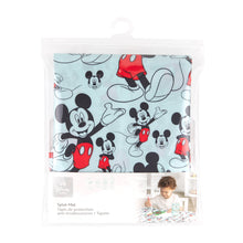 Load image into Gallery viewer, Bumkins Splat Mat: Mickey Mouse is shown folded in plastic packaging bag with a hanger and cardboard insert.