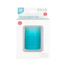 Load image into Gallery viewer, Bumkins Silicone Starter Cup: Blue is shown in a white packaging box, with a front window displaying the cup.