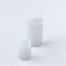 Load image into Gallery viewer, Bumkins Silicone Starter Cup: Gray sits in front of a larger gray cup on a white background.
