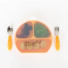 Load image into Gallery viewer, Bumkins Silicone Stretch Lid for Grip Dish 3 Section, Grip Plate with the word "Ollie" covers a plate on a white background with utensils.