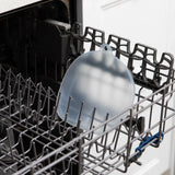 Bumkins Silicone Stretch Lid for Grip Dish 3 Section, Grip Plate sits in the top rack of an open dishwasher.