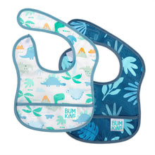Load image into Gallery viewer, Bumkins Starter Bib 2 Pack: Dinosaurs & Blue Tropic includes 2 waterproof bibs with dinosaur and blue tropical leaf designs.