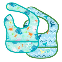 Load image into Gallery viewer, Bumkins Starter Bib 2 Pack: Ocean Life & Whale Tail includes 2 blue waterproof bibs with ocean-themed designs.