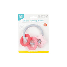 Load image into Gallery viewer, Bumkins Silicone Teething Charms: Pink is shown affixed to a white cardboard packaging card.
